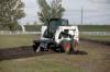 Bobcat S169 Skid Steer with Trencher and Pallet Fork