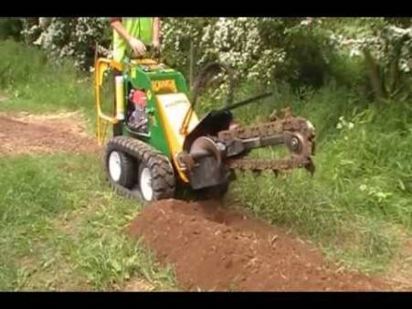 KANGA WITH TRENCHER ATTACHMENT &BKT for hire