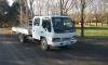 Isuzu NPR300 crew mowing
