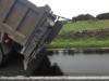 Aggregate spreader trucks